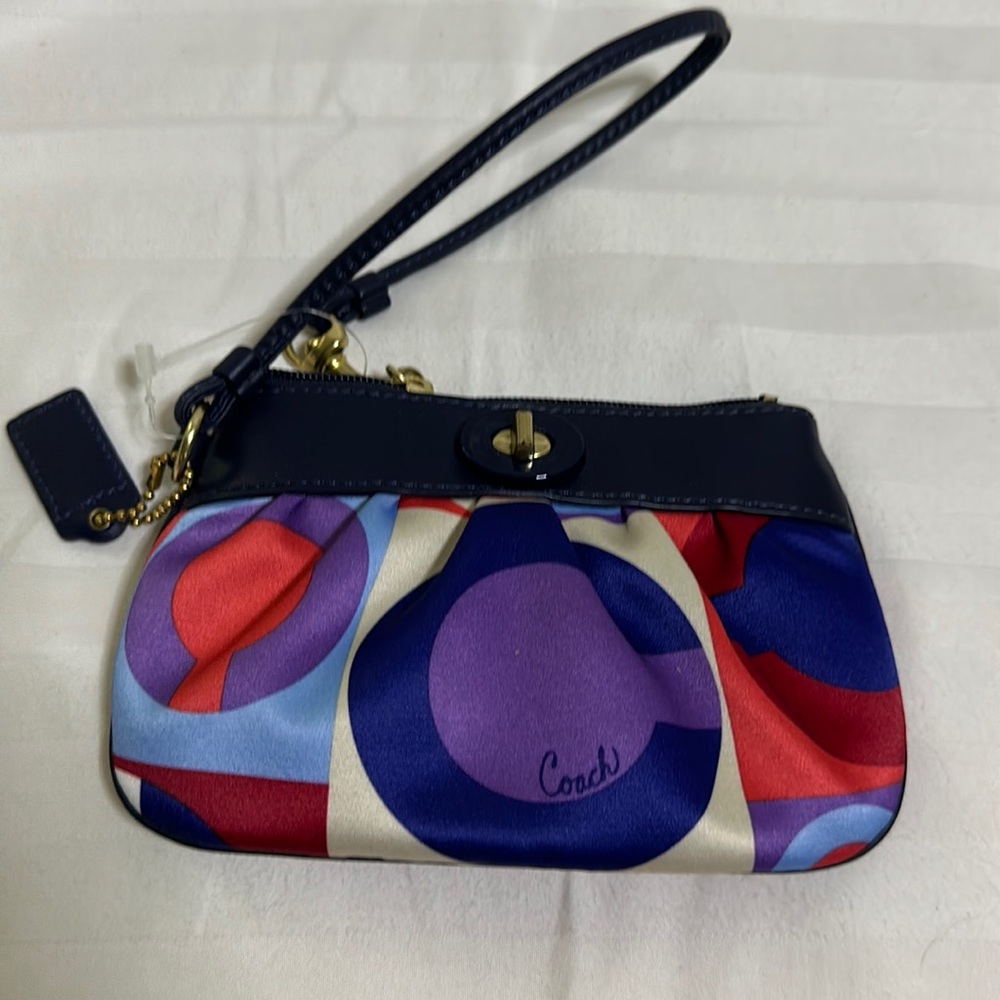 NWT Coach resort op art wristlet 42169